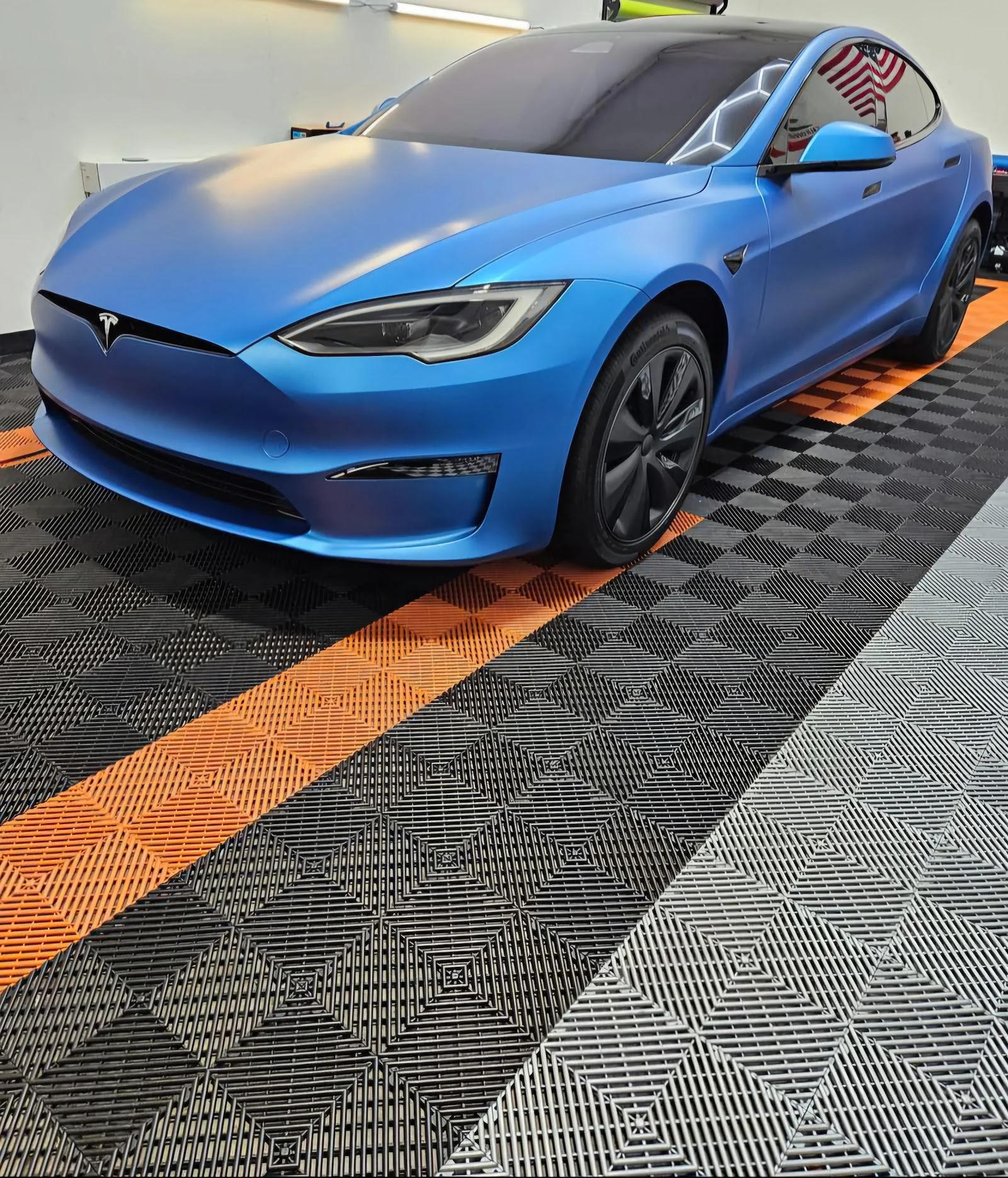 Inside Yairs window tint — shop interior and work bay